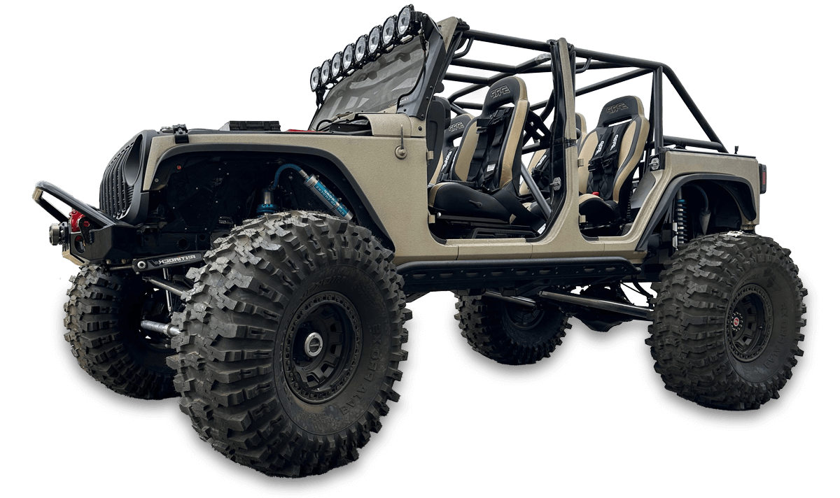 Custom lifted tan Jeep build with massive off-road tires